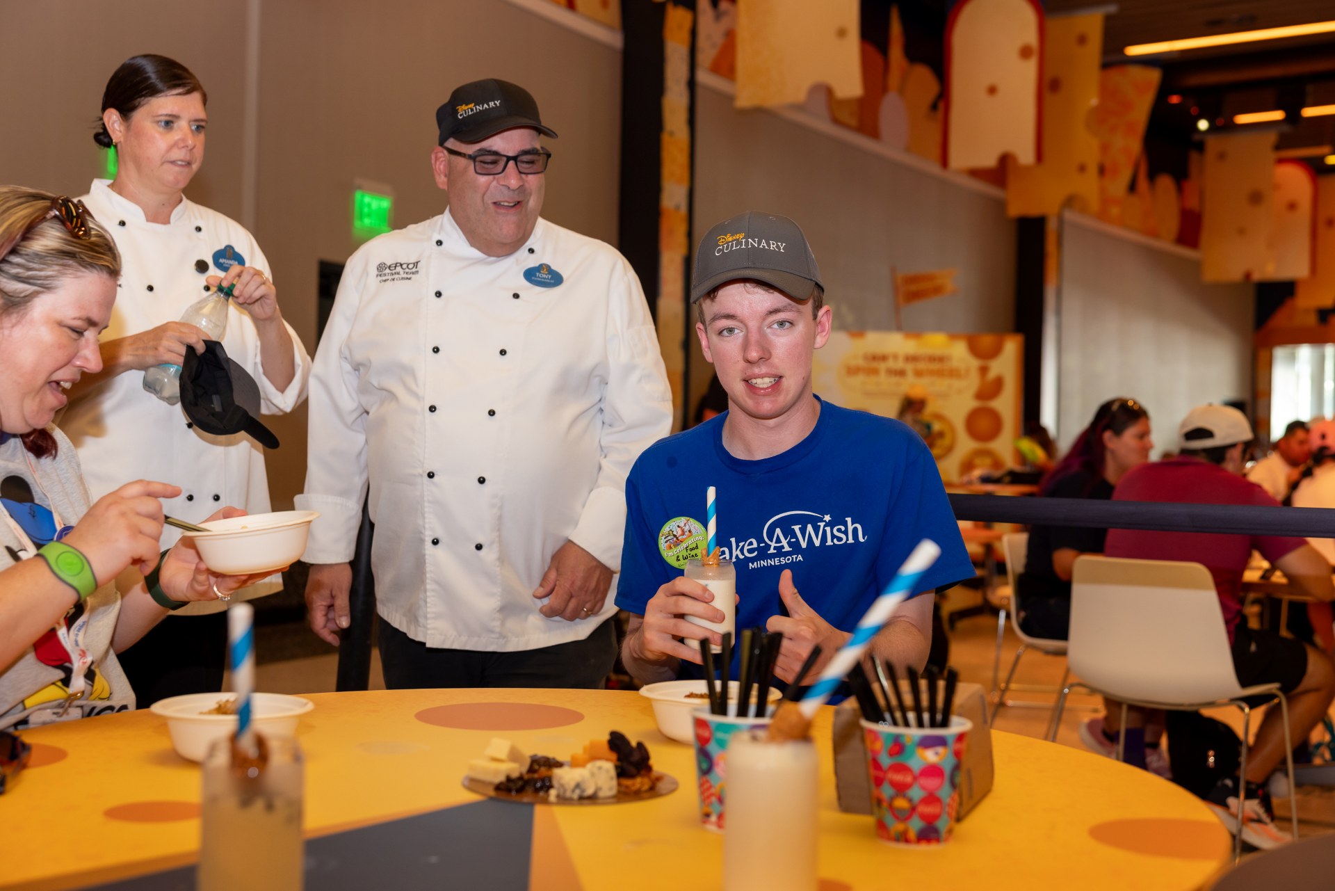 Official source photo for EPCOT Chefs Bring Wish Kid Into the Kitchen With Goofy